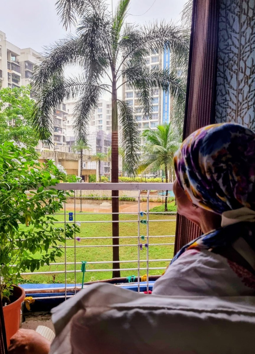 Daadi during chemotherapy, looking out at the palm trees from her balcony
