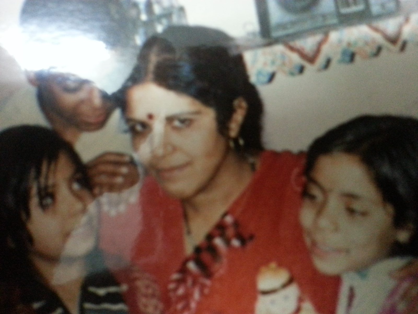 Young Kalpana Ramani with her three children — Pappal, Mona and Ajju