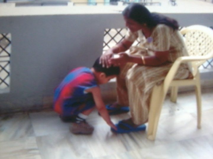 Rohan seeking blessings from his grandmother