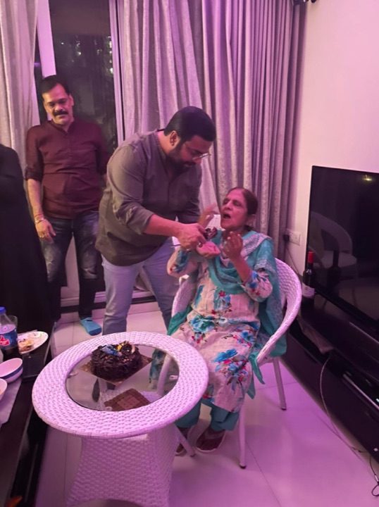 A first bite of cake, given to Kalpana