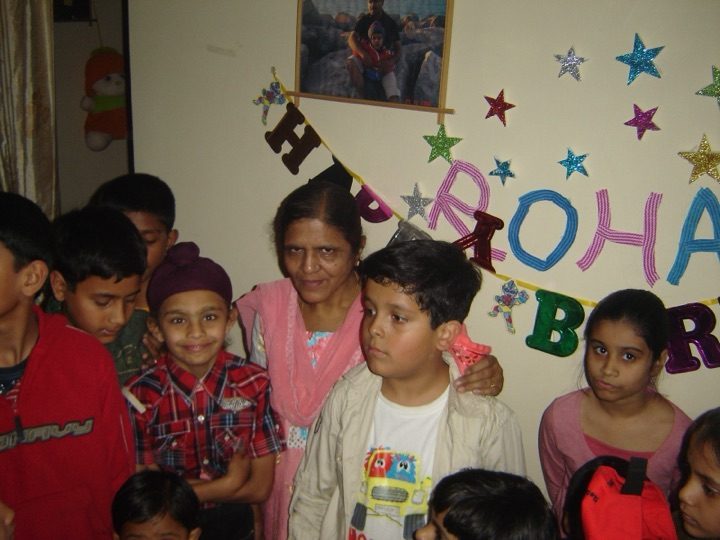 Kalpana playing with the grandchildren